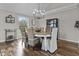 Elegant dining room with stylish chandelier, hardwood floors, and ample seating at 5455 S 800 E, Zionsville, IN 46077