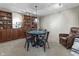 Finished basement offering a game table, comfortable seating, and built-in shelving for a relaxing space at 5455 S 800 E, Zionsville, IN 46077