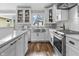 Well-lit kitchen featuring quartz countertops, stainless steel appliances, and modern fixtures at 5455 S 800 E, Zionsville, IN 46077