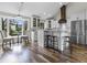 Eat-in kitchen features a breakfast bar, stainless steel appliances, and ample cabinet space at 5455 S 800 E, Zionsville, IN 46077