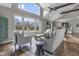 Bright living room featuring large windows, vaulted ceilings, and neutral decor at 5455 S 800 E, Zionsville, IN 46077