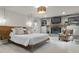Main bedroom featuring a modern stone fireplace, built-in cabinets, a woven light fixture, and carpet at 5455 S 800 E, Zionsville, IN 46077