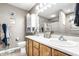 Bright bathroom featuring double sinks, a large mirror, and plenty of storage space at 558 Prince Dr, Greenwood, IN 46142