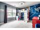 Colorful bedroom with a loft bed, desk area, and plenty of space to play and study at 558 Prince Dr, Greenwood, IN 46142