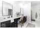Modern bathroom with double sinks, a vanity area, and a stylish walk-in shower at 561 Riviera Pl, Greenwood, IN 46143