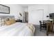 Cozy bedroom with a bed, desk, closet, and ample natural light at 561 Riviera Pl, Greenwood, IN 46143