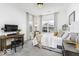 Comfortable bedroom with natural light, stylish desk, and contemporary décor at 561 Riviera Pl, Greenwood, IN 46143