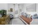 Bright bedroom with a daybed, dresser, plush chair, and ample natural light at 561 Riviera Pl, Greenwood, IN 46143