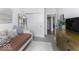 Well-lit bedroom featuring a daybed, dresser, and closet for ample storage at 561 Riviera Pl, Greenwood, IN 46143