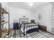 Charming bedroom with soft textures, a decorative rug, and natural light at 561 Riviera Pl, Greenwood, IN 46143