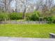 A well-maintained backyard, enclosed with a charming wooden fence, creating a private outdoor space at 575 Crestpoint Ln, Plainfield, IN 46168