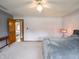 Bright bedroom featuring neutral walls, carpet, and a comfortable bed at 575 Crestpoint Ln, Plainfield, IN 46168