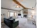 Spacious living room with a brick fireplace, large windows, and comfortable seating area at 575 Crestpoint Ln, Plainfield, IN 46168