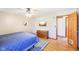 Comfortable bedroom with natural light, and dresser, and hardwood floors at 5831 Bar Del W Dr, Indianapolis, IN 46221