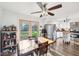 Bright kitchen and dining area featuring stainless steel appliances and a view of the backyard at 5831 Bar Del W Dr, Indianapolis, IN 46221
