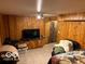 Basement featuring wood paneled walls and recessed lighting at 5846 Bellsville Pike, Columbus, IN 47201