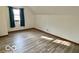 Bedroom with wood floors and natural light at 5846 Bellsville Pike, Columbus, IN 47201