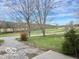 Scenic view of the neighborhood, with trees in the front yard at 5846 Bellsville Pike, Columbus, IN 47201