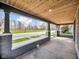 Spacious porch area offering ample room for relaxing and enjoying neighborhood views at 609 E Southern Ave, Indianapolis, IN 46203