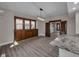 Spacious living room boasting hardwood floors, and large windows offering natural light at 609 E Southern Ave, Indianapolis, IN 46203