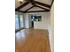 View of the kitchen with stainless steel appliances from the living room at 613 Rahkewood Dr, Indianapolis, IN 46217