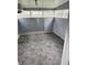 An unfinished sunroom filled with light features neutral paint colors at 613 Rahkewood Dr, Indianapolis, IN 46217