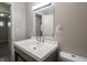 Bathroom vanity features a modern countertop, sleek faucet, and ample storage beneath the sink at 6189 Vigo Dr, Clayton, IN 46118