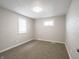 This bedroom features carpet floors and a window providing natural light at 6189 Vigo Dr, Clayton, IN 46118