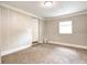 Spacious bedroom with neutral paint, carpet, and a window at 6189 Vigo Dr, Clayton, IN 46118
