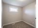 This bedroom features carpet floors, a window, and an outlet at 6189 Vigo Dr, Clayton, IN 46118