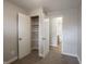 This bedroom features an open closet and bathroom access at 6189 Vigo Dr, Clayton, IN 46118