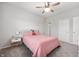 Bedroom featuring neutral carpet and walls, plus a ceiling fan at 6323 Emerald Field Way, Indianapolis, IN 46221