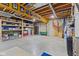 Unfinished basement with exposed ceiling and organized storage space at 6841 W Glory Maple Dr, McCordsville, IN 46055