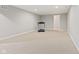 Large and open basement area with neutral carpet and exercise equipment at 6841 W Glory Maple Dr, McCordsville, IN 46055