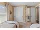 Cozy bedroom with large closet and neutral colors, promoting relaxation at 6841 W Glory Maple Dr, McCordsville, IN 46055