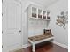 Well-organized mudroom with bench, storage, and decorative accents at 6841 W Glory Maple Dr, McCordsville, IN 46055