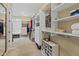 Spacious walk-in closet with custom shelving, hanging rods, and shoe storage for organized storage at 6841 W Glory Maple Dr, McCordsville, IN 46055