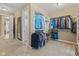 Large walk-in closet featuring ample shelving and hanging space for clothes and accessories at 6841 W Glory Maple Dr, McCordsville, IN 46055