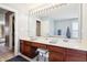 Bathroom featuring dual sinks, generous counter space, and classic vanity at 7354 Ponderosa Pines Ln, Indianapolis, IN 46239