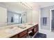 Bathroom featuring dual sinks, generous counter space, and classic vanity at 7354 Ponderosa Pines Ln, Indianapolis, IN 46239