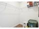 Walk-in closet with ample storage space, including wire shelving and storage bins at 7354 Ponderosa Pines Ln, Indianapolis, IN 46239