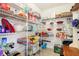 Walk-in pantry featuring wire shelving, offering ample storage space for food and household items at 7354 Ponderosa Pines Ln, Indianapolis, IN 46239