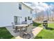 Patio featuring outdoor seating and a grill, perfect for entertaining and enjoying the outdoors at 7354 Ponderosa Pines Ln, Indianapolis, IN 46239