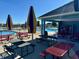 Community picnic area near the pool, furnished with tables and seating at 7354 Ponderosa Pines Ln, Indianapolis, IN 46239