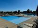 Community swimming pool area with lounge chairs for relaxing by the poolside at 7354 Ponderosa Pines Ln, Indianapolis, IN 46239
