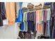 Organized walk-in closet with clothing racks and shelving to keep your wardrobe tidy at 7354 Ponderosa Pines Ln, Indianapolis, IN 46239