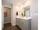 Bathroom featuring double vanity with modern fixtures and large mirror at 7628 Big Bend Blvd, Camby, IN 46113