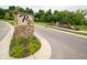 Community sign surrounded by lush greenery and well-maintained landscaping at 7628 Big Bend Blvd, Camby, IN 46113