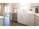 Kitchen with stainless steel dishwasher and sleek countertops at 7628 Big Bend Blvd, Camby, IN 46113