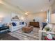 Cozy living room featuring comfortable sofas, decorative pillows, stylish decor, and a patterned rug at 7628 Big Bend Blvd, Camby, IN 46113